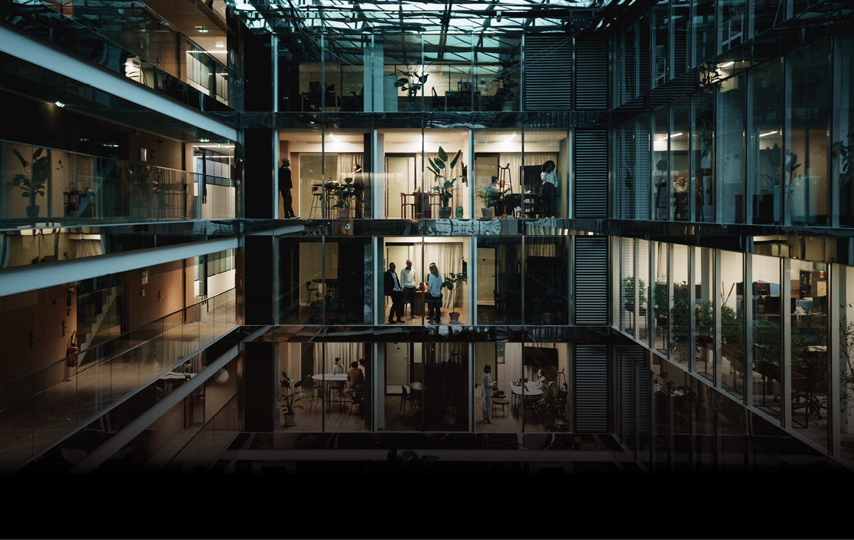 Modern office building by night in Paris, France